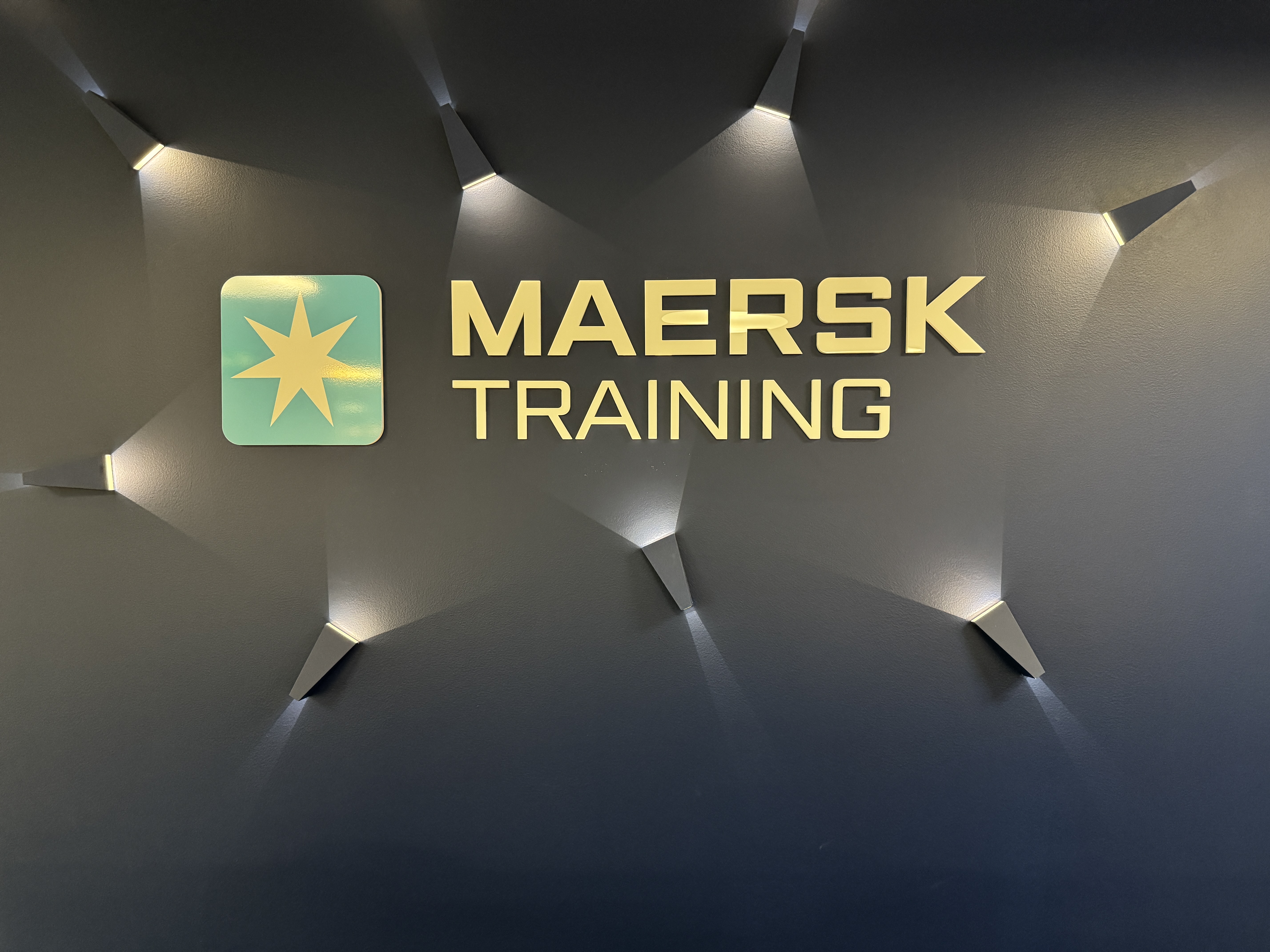 Big white sign that spells R E S Q in a large red background.