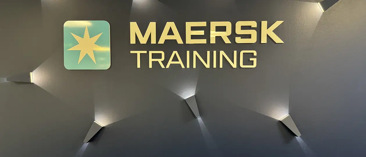 Big white sign that spells R E S Q in a large red background.